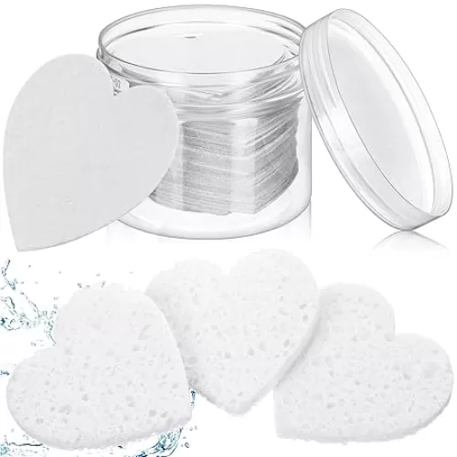 Nuenen 60 Pieces Facial Sponges with Container, Heart Shape Compressed Face Sponges Natural Cleaning Pads for Washing Face Cleaning Exfoliating Esthetician Makeup Removal(Pink)