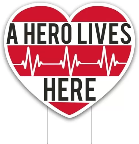 VictoryStore Yard Decorations: A Hero Lives Here Yard Sign - Waterproof Heart Shaped Sign, Measures 22 Inches By 19 Inches Includes 2 Ez Stakes