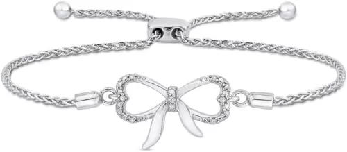 KATARINA Bow and Heart Shaped Infinity Diamond Tennis Bracelet in Sterling Silver (1/20 cttw) (Color-JK, Clarity-I1-I2)